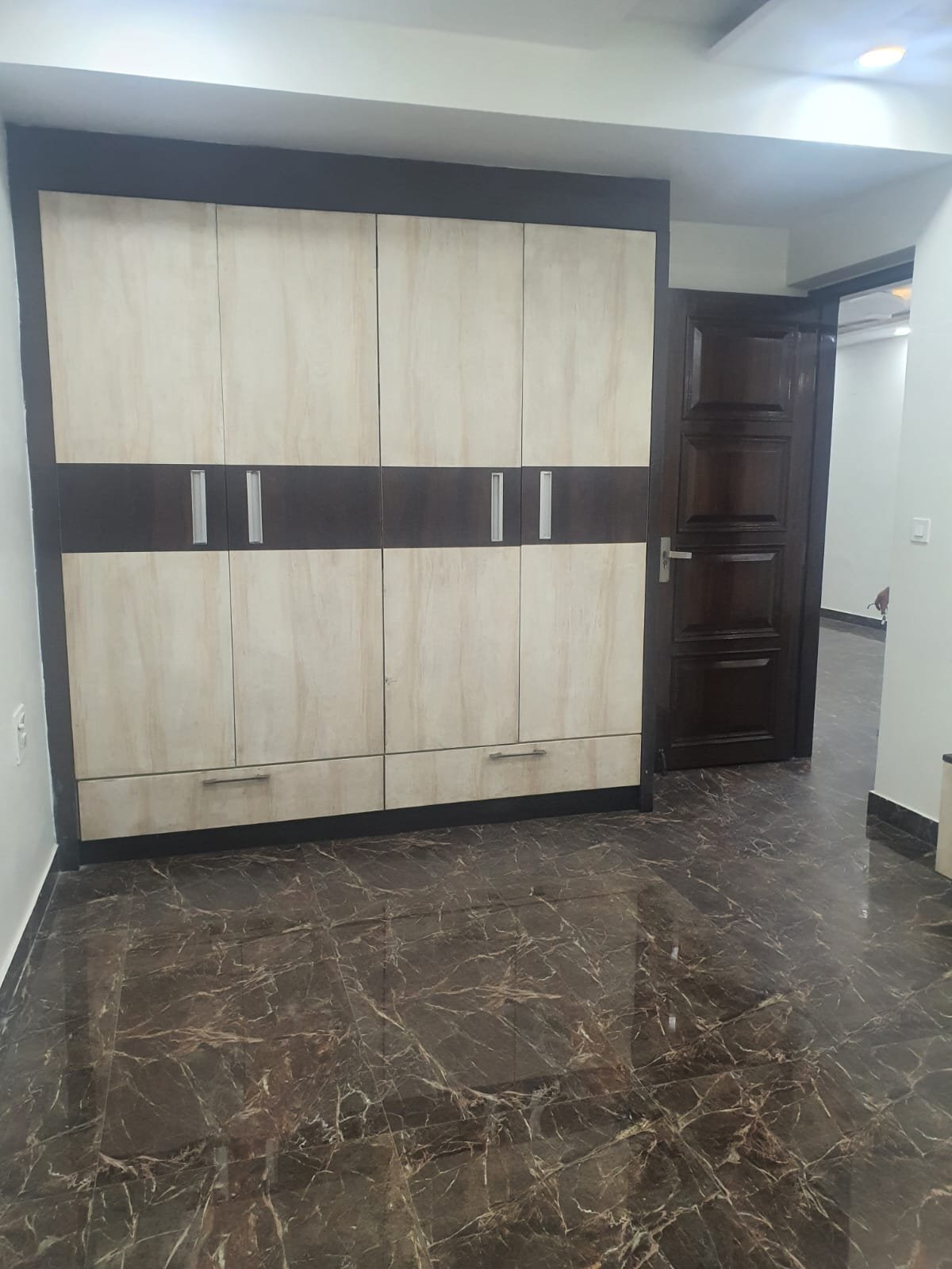 Front view of fully extended 4 BHK DDA MIG Flat on ground floor in C1A Block, Janakpuri