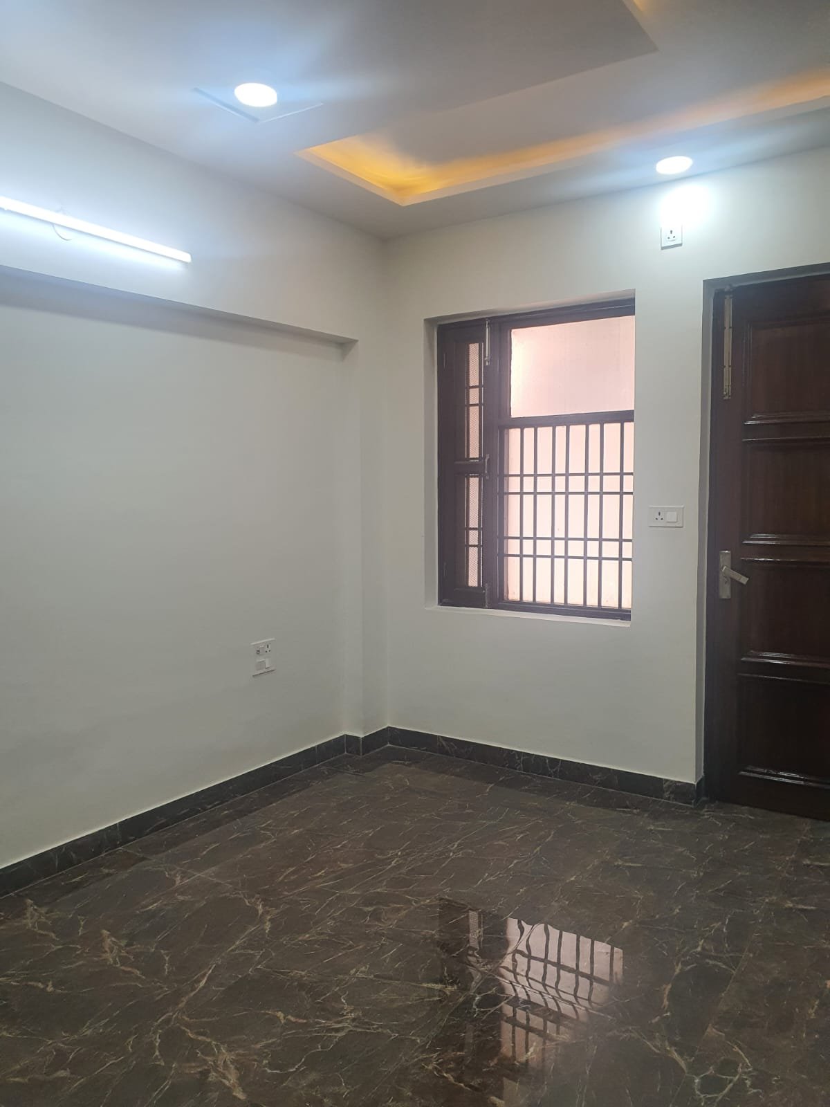 Front view of fully extended 4 BHK DDA MIG Flat on ground floor in C1A Block, Janakpuri
