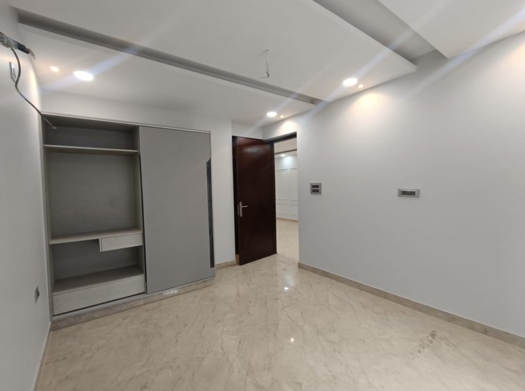Front view of a newly renovated 3 BHK DDA MIG Flat on the first floor in B3B Block Janakpuri, featuring dual balconies, modern design, and corner location.