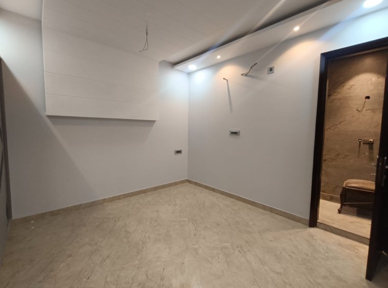 Front view of a newly renovated 3 BHK DDA MIG Flat on the first floor in B3B Block Janakpuri, featuring dual balconies, modern design, and corner location.
