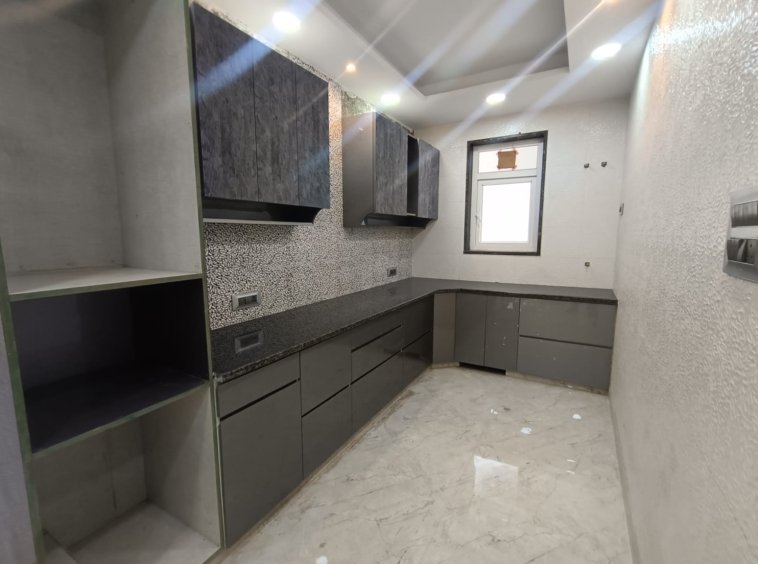Front view of a newly renovated 3 BHK DDA MIG Flat on the first floor in B3B Block Janakpuri, featuring dual balconies, modern design, and corner location.
