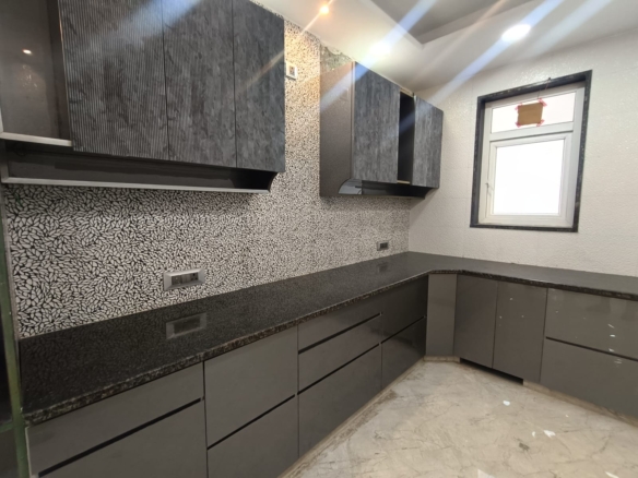 Front view of a newly renovated 3 BHK DDA MIG Flat on the first floor in B3B Block Janakpuri, featuring dual balconies, modern design, and corner location.