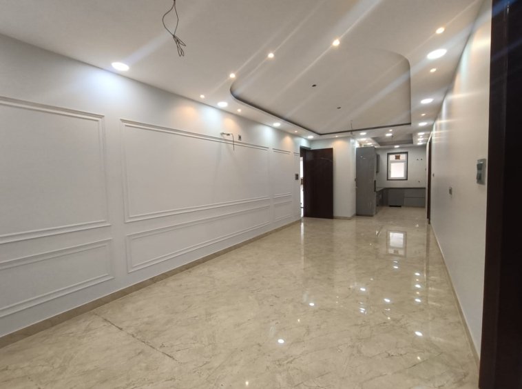 Front view of a newly renovated 3 BHK DDA MIG Flat on the first floor in B3B Block Janakpuri, featuring dual balconies, modern design, and corner location.