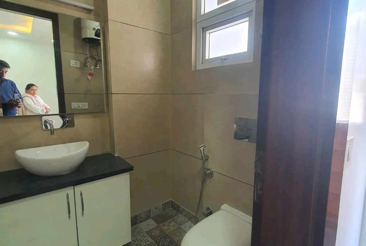 80 Gaj top-floor corner builder floor with 2 BHK on third floor and 1 BHK on roof in C4F Block Janakpuri.