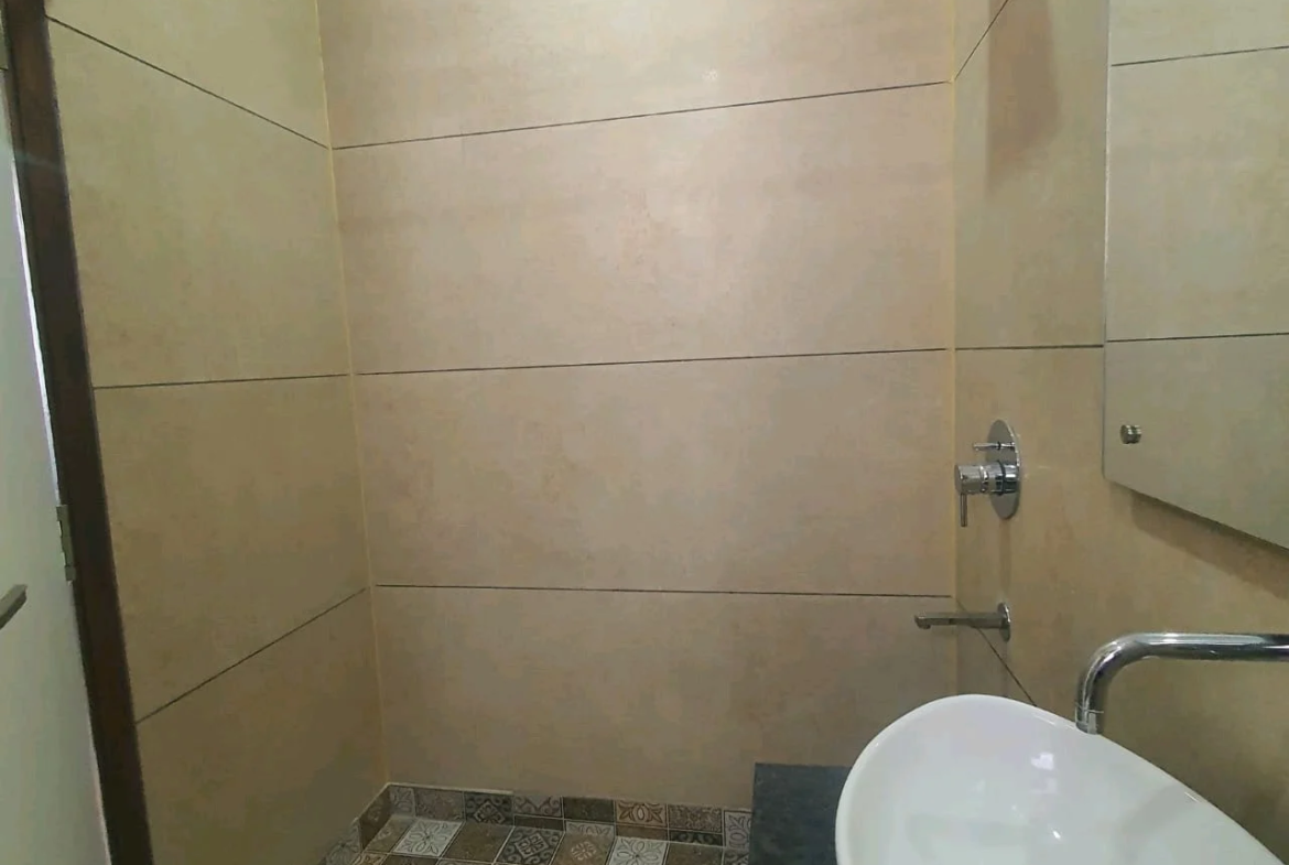 80 Gaj top-floor corner builder floor with 2 BHK on third floor and 1 BHK on roof in C4F Block Janakpuri.