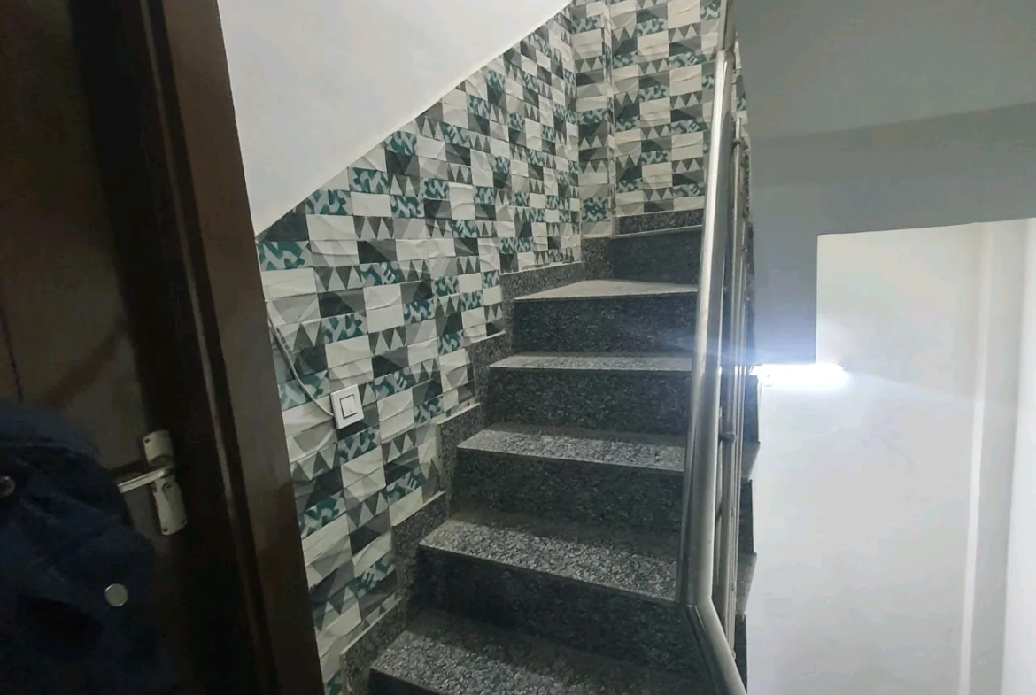 80 Gaj top-floor corner builder floor with 2 BHK on third floor and 1 BHK on roof in C4F Block Janakpuri.