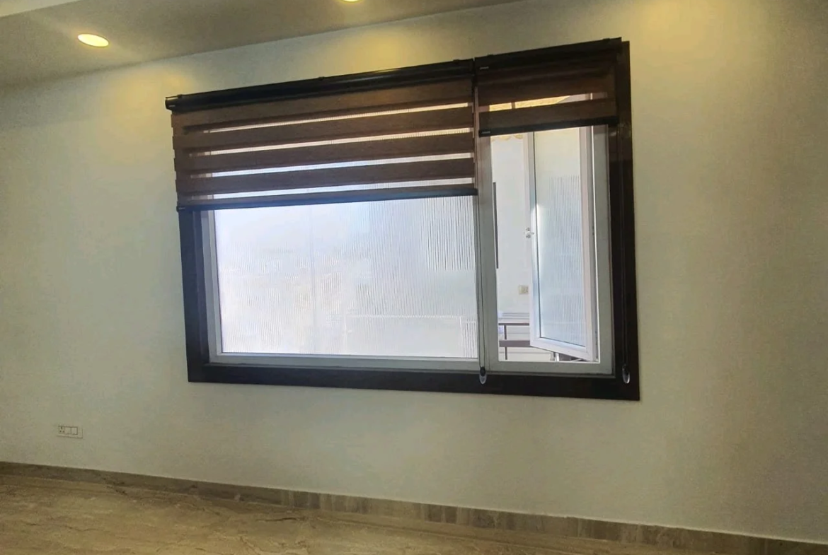 80 Gaj top-floor corner builder floor with 2 BHK on third floor and 1 BHK on roof in C4F Block Janakpuri.