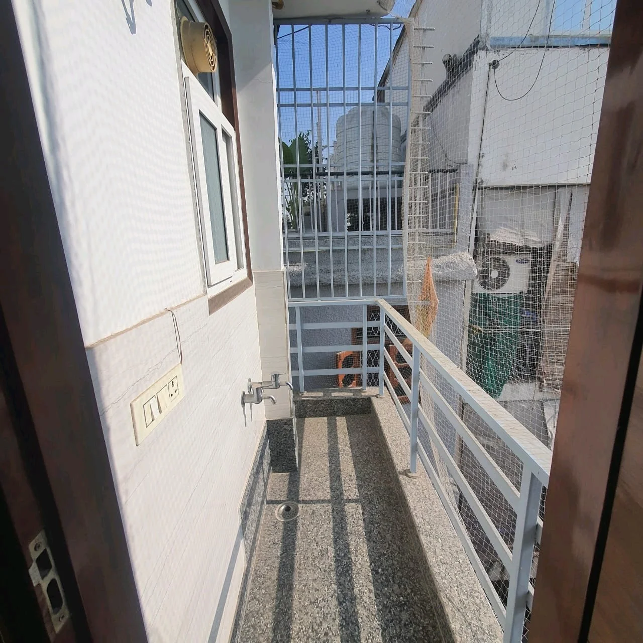 80 Gaj top-floor corner builder floor with 2 BHK on third floor and 1 BHK on roof in C4F Block Janakpuri.