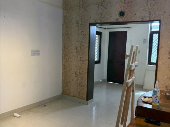 Spacious 2 BHK first-floor for rent in C6B Block Janakpuri featuring a modular kitchen and wide balcony. Rent ₹25,000. Ideal for comfortable family living.