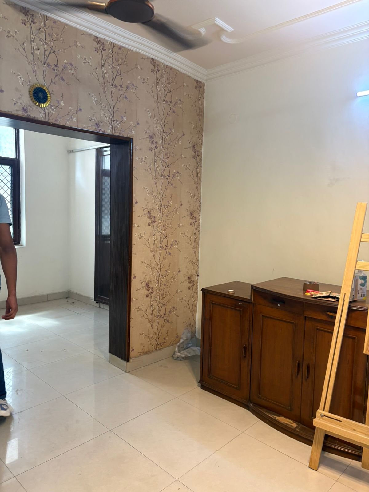 Spacious 2 BHK first-floor for rent in C6B Block Janakpuri featuring a modular kitchen and wide balcony. Rent ₹25,000. Ideal for comfortable family living.