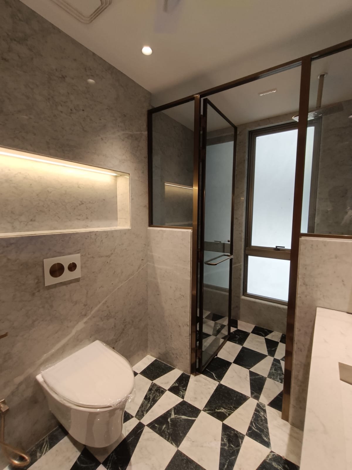 Premium Kohler bathroom with modern fittings luxury builder floor Janakpuri