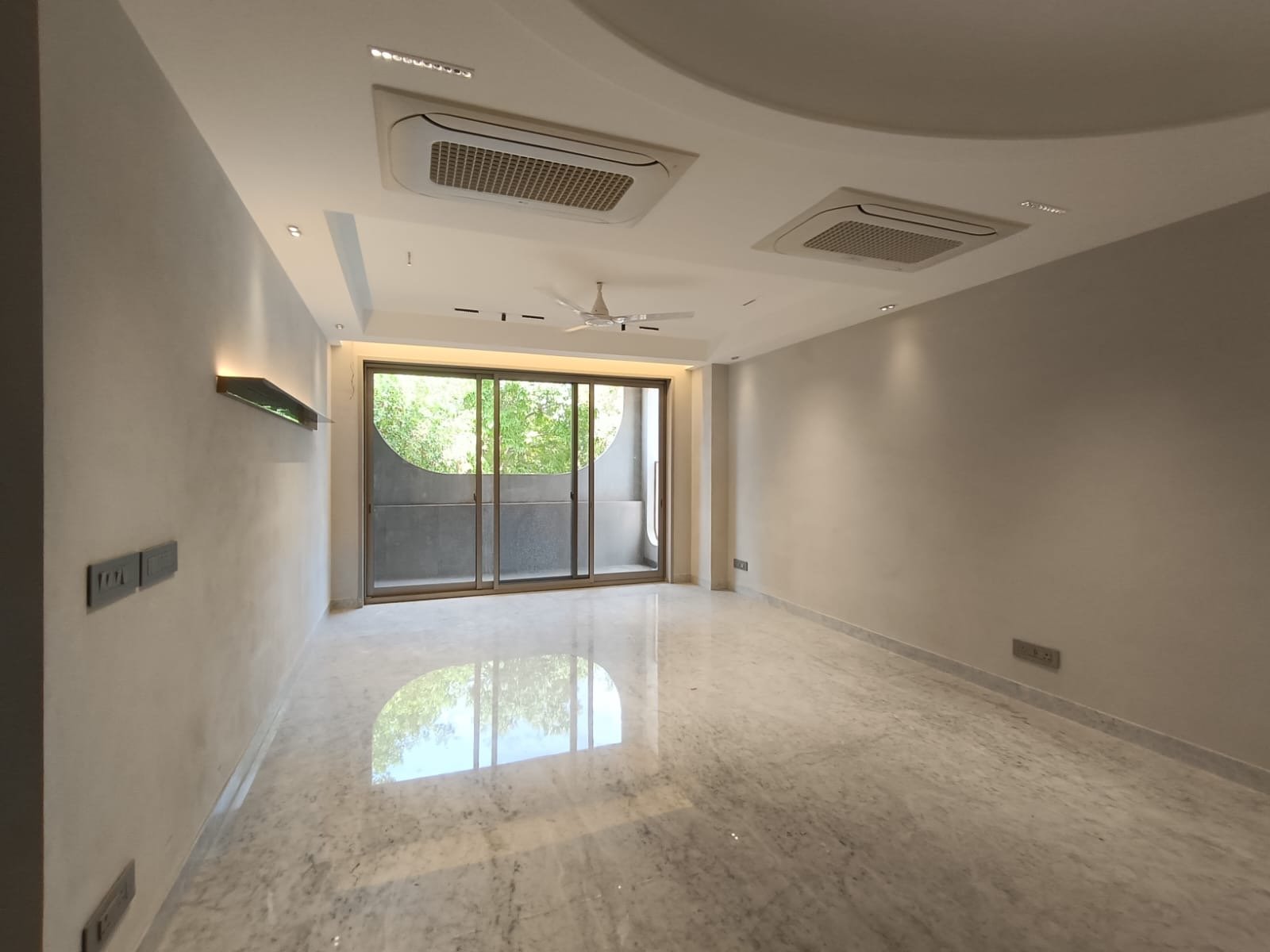 Spacious 4 BHK living room with Italian marble flooring Janakpuri