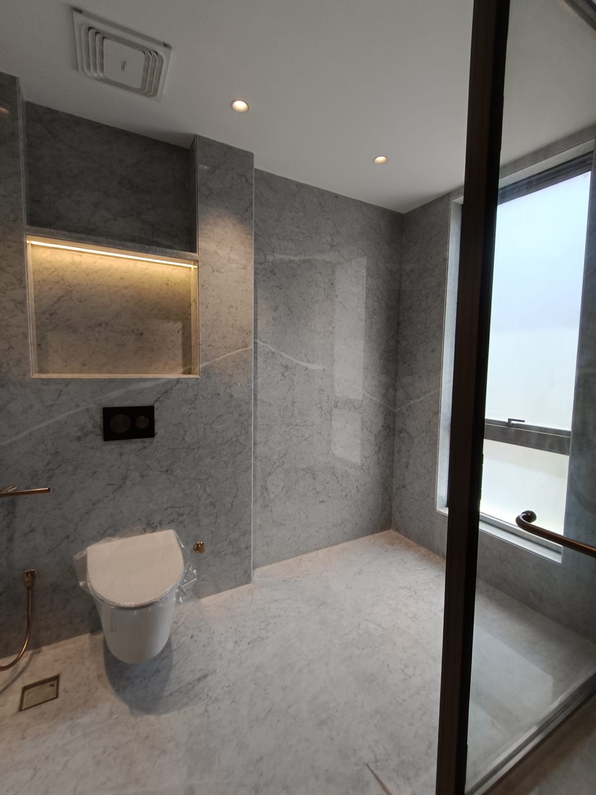 Premium Kohler bathroom with modern fittings luxury builder floor Janakpuri