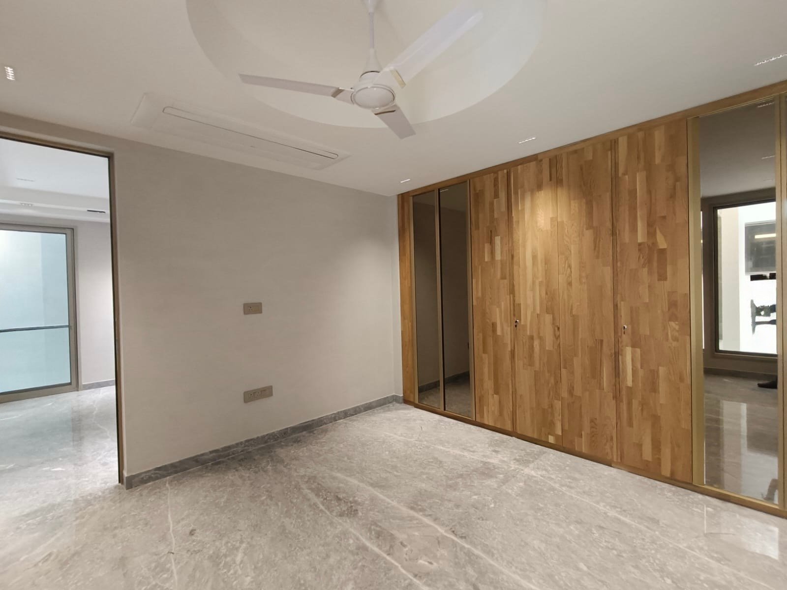 Master bedroom with biophilic design and natural ventilation Janakpuri