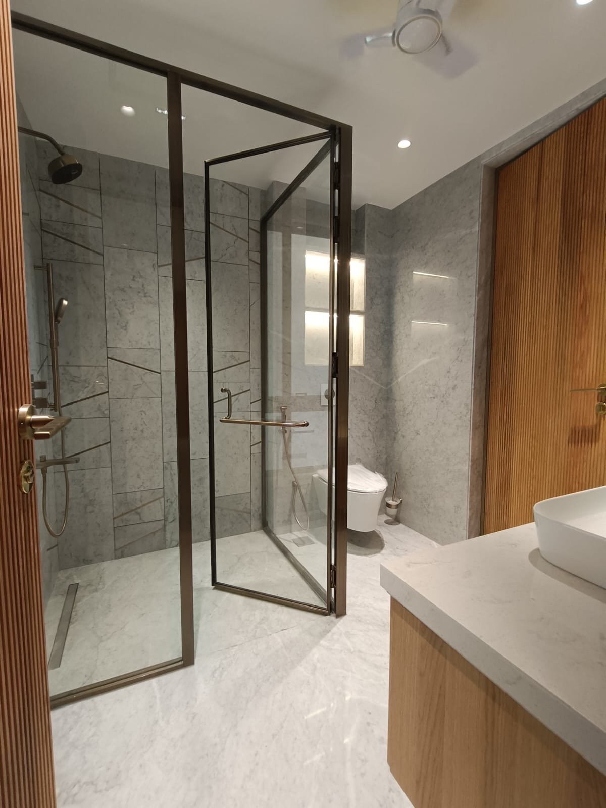 Premium Kohler bathroom with modern fittings luxury builder floor Janakpuri